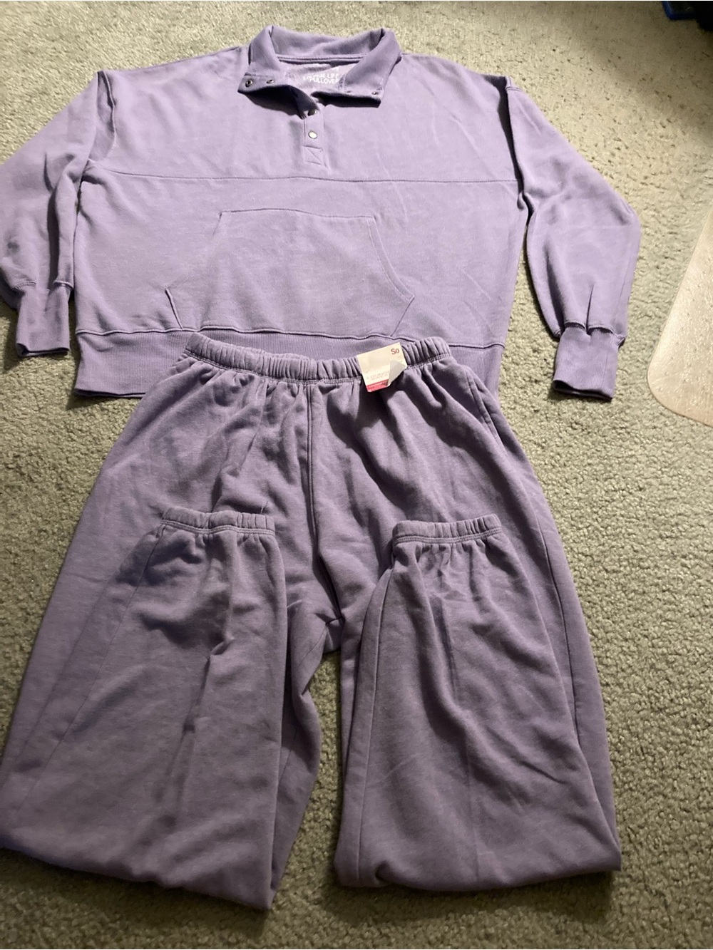 Woman’s large sweatsuit